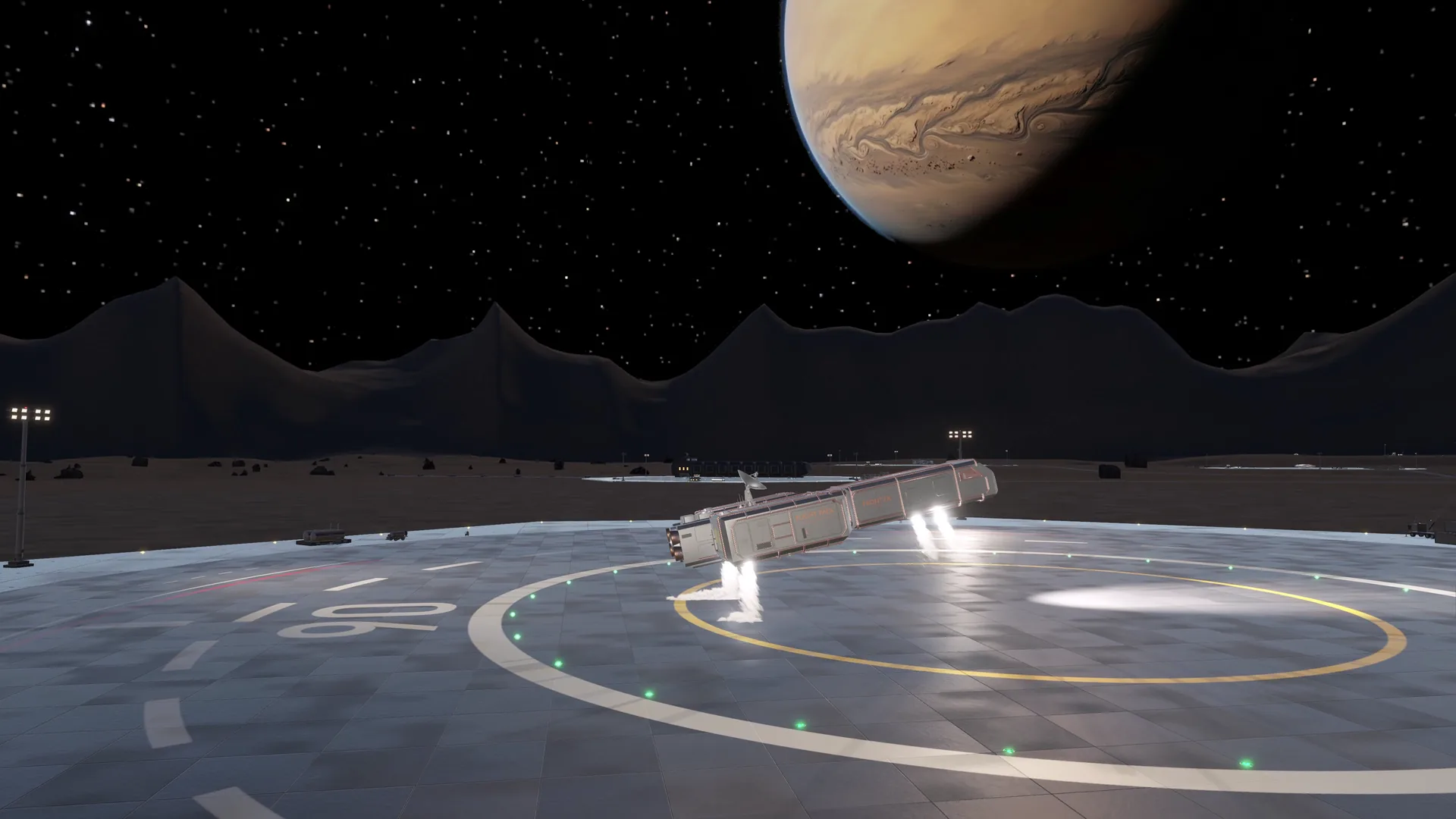 A boxy silver cargo ship hovers on white thruster jets over a circular landing pad, a banded orange gas giant filling the sky above.